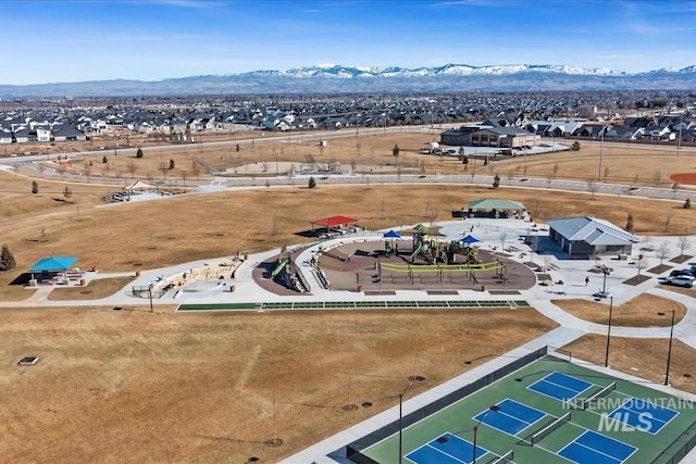 drone / aerial view with a residential view and a mountain view