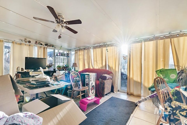 misc room featuring ceiling fan and light tile patterned floors