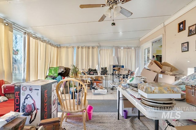 sunroom / solarium with ceiling fan