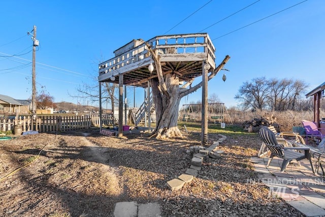 view of yard with a wooden deck