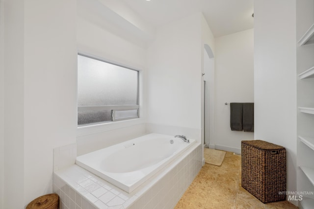 327 E Rockingham Dr, Eagle, ID 83616 - full bath with a garden tub and tile patterned flooring