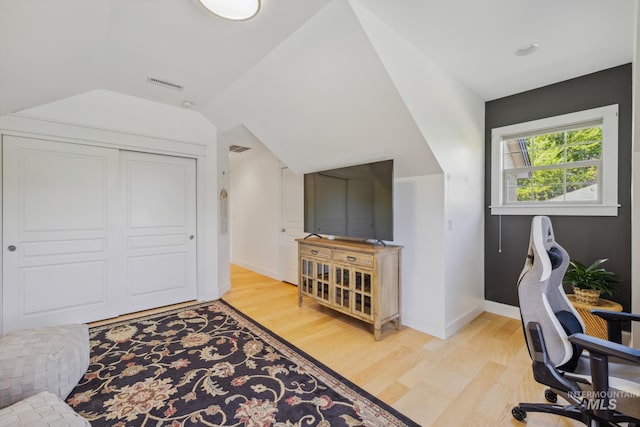 327 E Rockingham Dr, Eagle, ID 83616 - office with light wood-type flooring, lofted ceiling, and baseboards