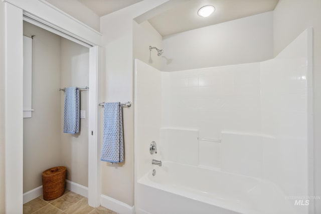 327 E Rockingham Dr, Eagle, ID 83616 - full bathroom featuring shower / bathtub combination, baseboards, and tile patterned floors