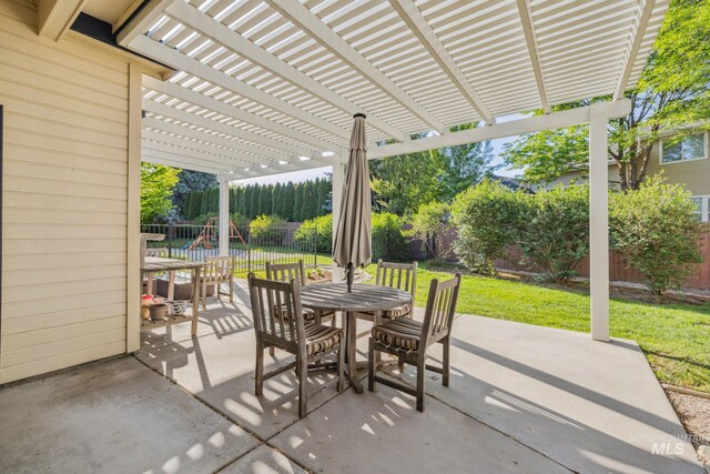 327 E Rockingham Dr, Eagle, ID 83616 - view of patio / terrace with outdoor dining space and a pergola