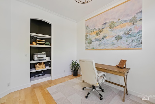 327 E Rockingham Dr, Eagle, ID 83616 - office space featuring ornamental molding, wood finished floors, built in features, and baseboards