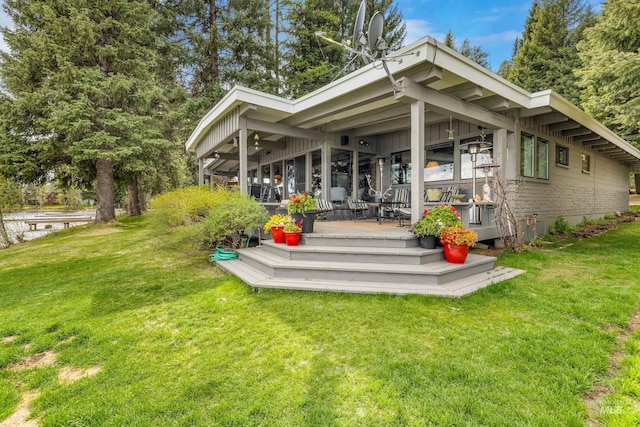 4076 Warren Wagon Rd, Mccall, ID 83638 - rear view of property with a yard and board and batten siding