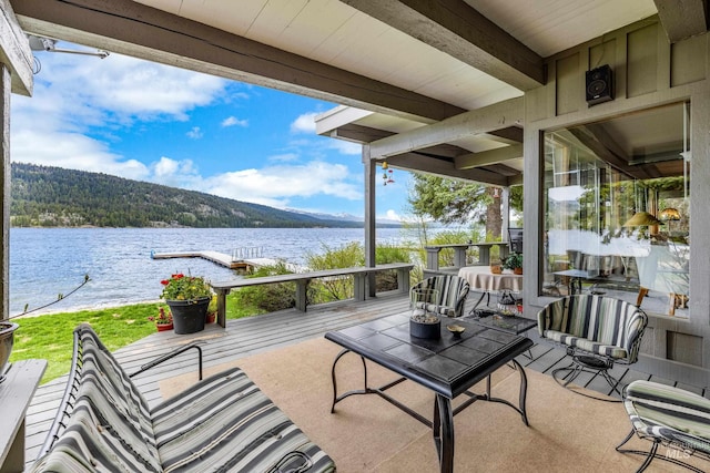 4076 Warren Wagon Rd, Mccall, ID 83638 - view of patio with a deck with water view and a view of trees