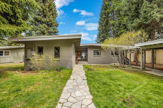 4076 Warren Wagon Rd, Mccall, ID 83638 - back of property featuring a lawn
