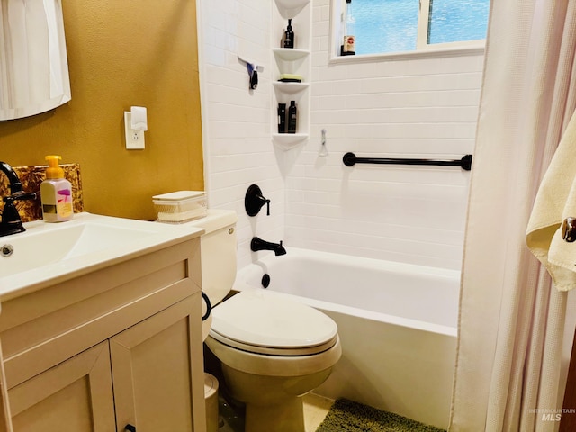 bathroom featuring toilet, vanity, shower / bath combination with curtain, and a textured wall