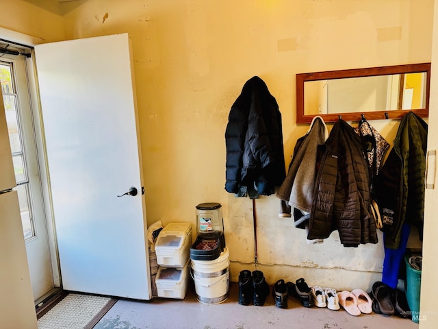 mudroom featuring concrete flooring