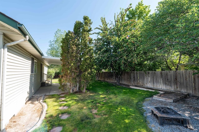 278 Trotter Dr, Twin Falls, ID 83301 - fenced backyard with an outdoor fire pit