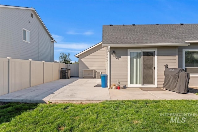 rear view of property with a patio