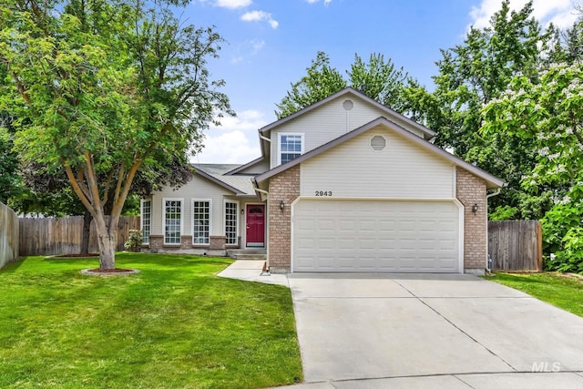 2943 S Zach Pl, Boise, ID 83706 - traditional-style house with a garage, brick siding, and driveway