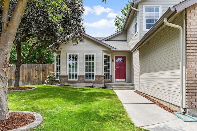 2943 S Zach Pl, Boise, ID 83706 - property entrance with brick siding and roof with shingles