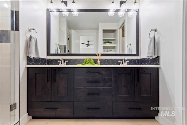 3268 S Sedgebrook Ln, Eagle, ID 83616 - full bath with double vanity, a sink, tasteful backsplash, and a shower with door