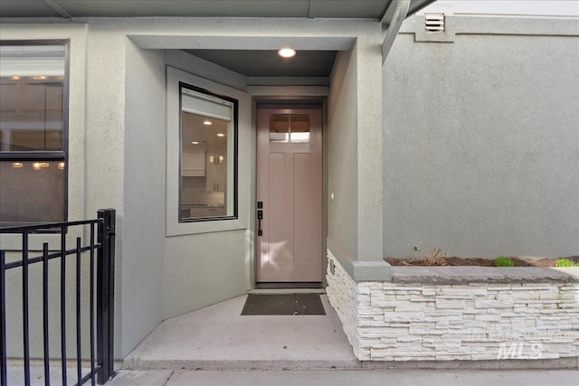 3268 S Sedgebrook Ln, Eagle, ID 83616 - entrance to property with elevator and stucco siding