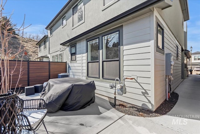 3268 S Sedgebrook Ln, Eagle, ID 83616 - view of home's exterior with a patio area and fence