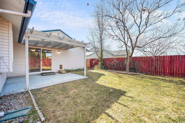 view of yard with a patio area, fence, and a pergola