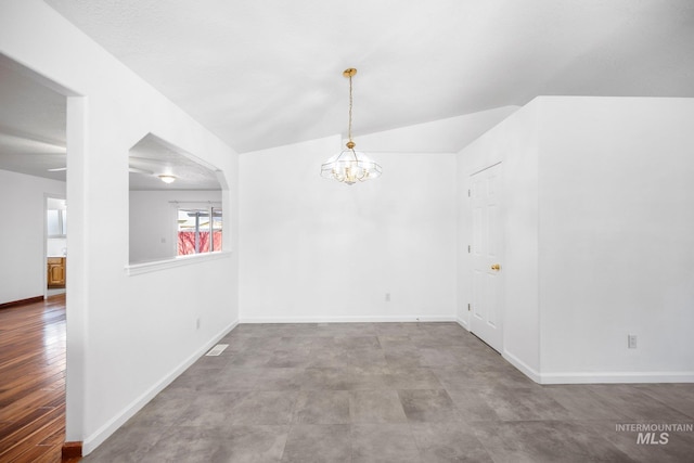 unfurnished dining area with an inviting chandelier and baseboards