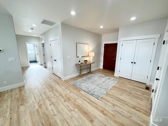 entrance foyer with light hardwood / wood-style floors