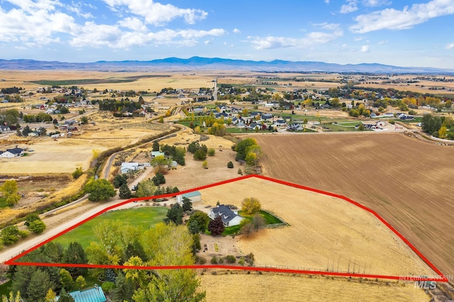 drone / aerial view featuring a mountain view