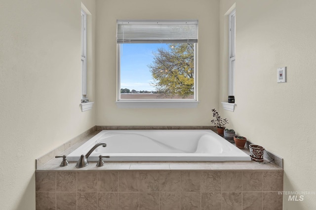 full bath featuring a garden tub