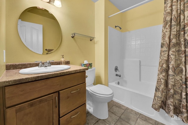 full bathroom with toilet, tile patterned flooring, shower / bath combination with curtain, and vanity