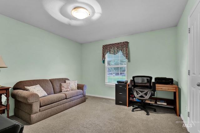 office space featuring carpet and baseboards