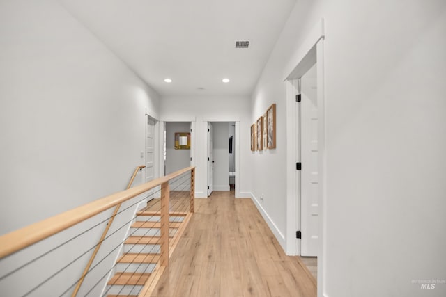 corridor featuring light wood-type flooring