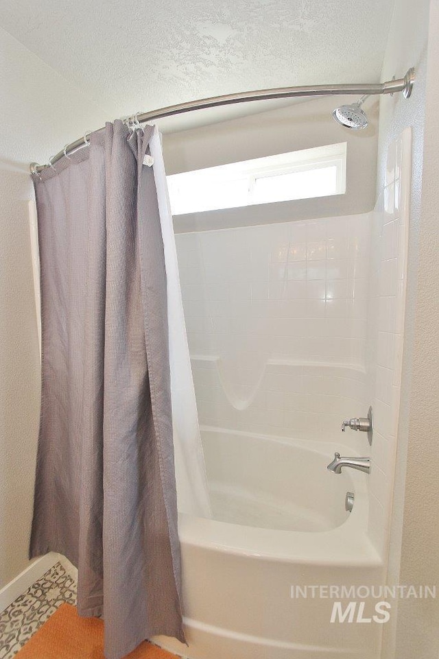 10382 Scout Ridge St, Nampa, ID 83687 - full bathroom with shower / tub combo and a textured ceiling