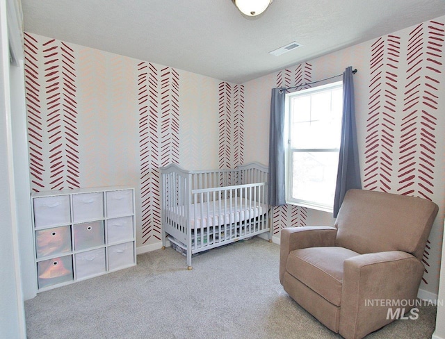 10382 Scout Ridge St, Nampa, ID 83687 - bedroom featuring carpet flooring and a nursery area