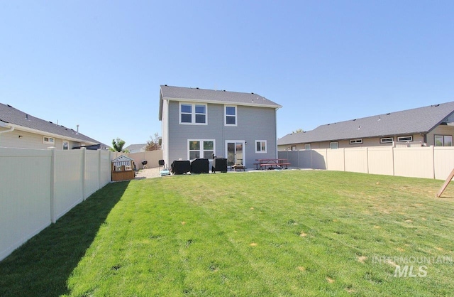 10382 Scout Ridge St, Nampa, ID 83687 - back of house featuring a patio area