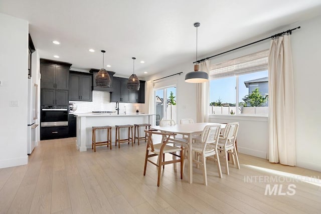 12524 W Shortcreek, Star, ID 83669 - dining space with light wood-style floors and recessed lighting