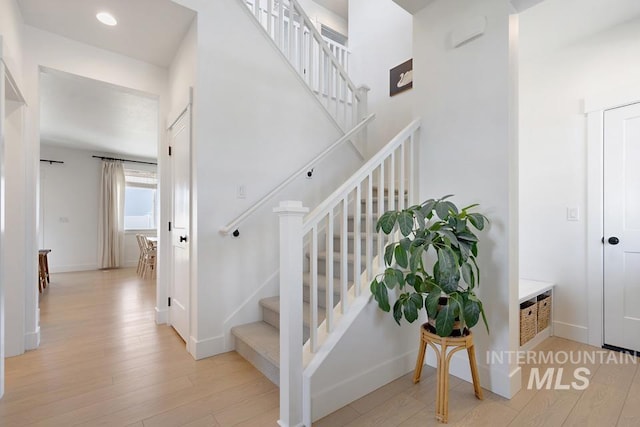 12524 W Shortcreek, Star, ID 83669 - stairway featuring wood finished floors and baseboards
