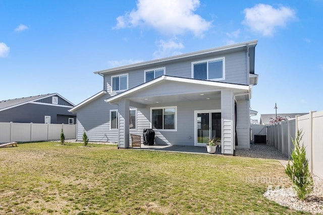 12524 W Shortcreek, Star, ID 83669 - back of property featuring a fenced backyard and a patio