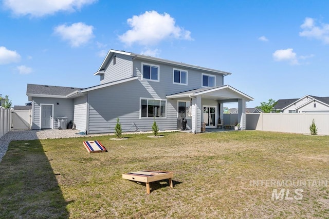 12524 W Shortcreek, Star, ID 83669 - rear view of property featuring a gate, a fenced backyard, and a patio
