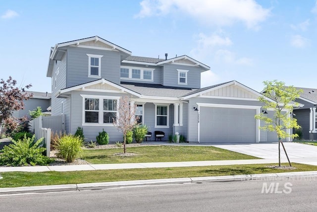 12524 W Shortcreek, Star, ID 83669 - view of front of home featuring a garage, concrete driveway, and board and batten siding