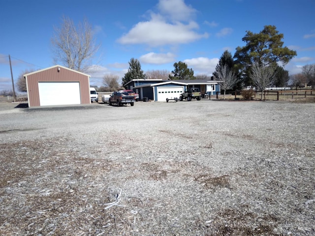 detached garage with fence