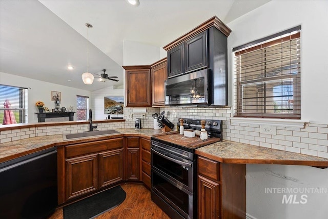 23 N 950 E, Declo, ID 83323 - kitchen featuring ceiling fan, backsplash, a sink, dark wood-style floors, and stainless steel appliances