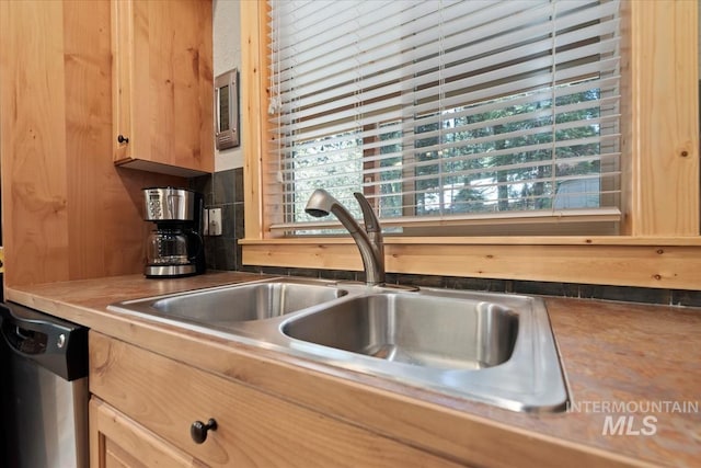 23 Waterline Ln, Cascade, ID 83611 - kitchen featuring stainless steel dishwasher and a sink