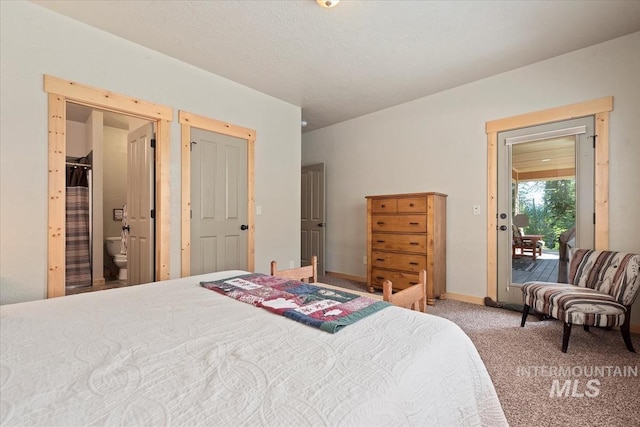 23 Waterline Ln, Cascade, ID 83611 - carpeted bedroom featuring access to outside and ensuite bath