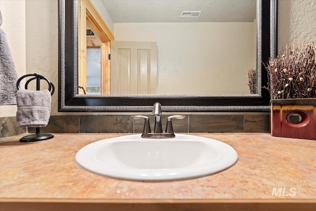 23 Waterline Ln, Cascade, ID 83611 - bathroom view of a textured wall and vanity