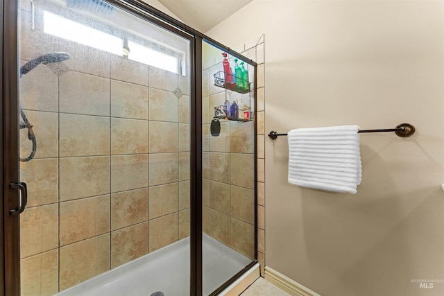 bathroom with a stall shower