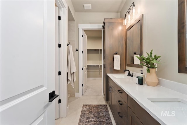 11966 W Zamalek Ct, Kuna, ID 83634 - full bath featuring double vanity, tile patterned floors, and a walk in closet