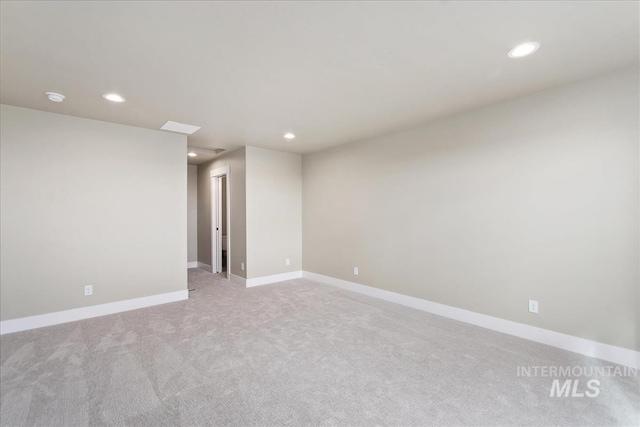 11966 W Zamalek Ct, Kuna, ID 83634 - unfurnished room with recessed lighting, light carpet, and a smoke detector