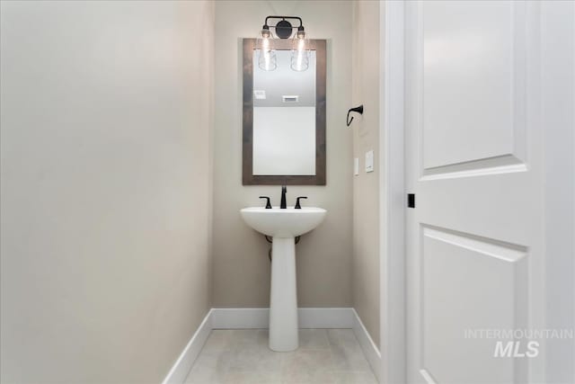 11966 W Zamalek Ct, Kuna, ID 83634 - bathroom with tile patterned flooring and baseboards