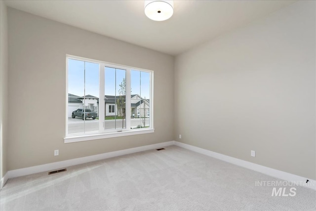 11966 W Zamalek Ct, Kuna, ID 83634 - unfurnished room with light colored carpet and baseboards