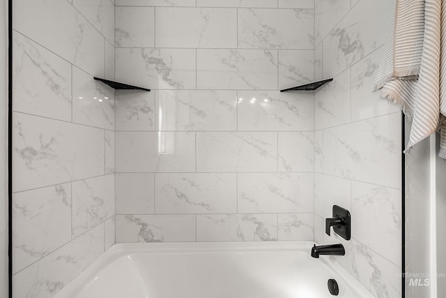 bathroom with shower / bathtub combination