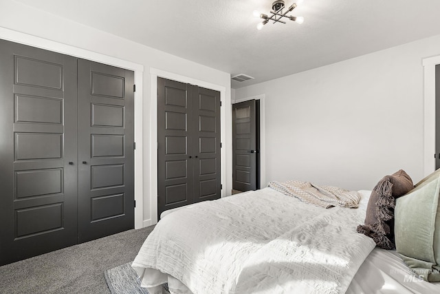 bedroom with carpet flooring and a closet