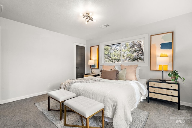 carpeted bedroom with baseboards